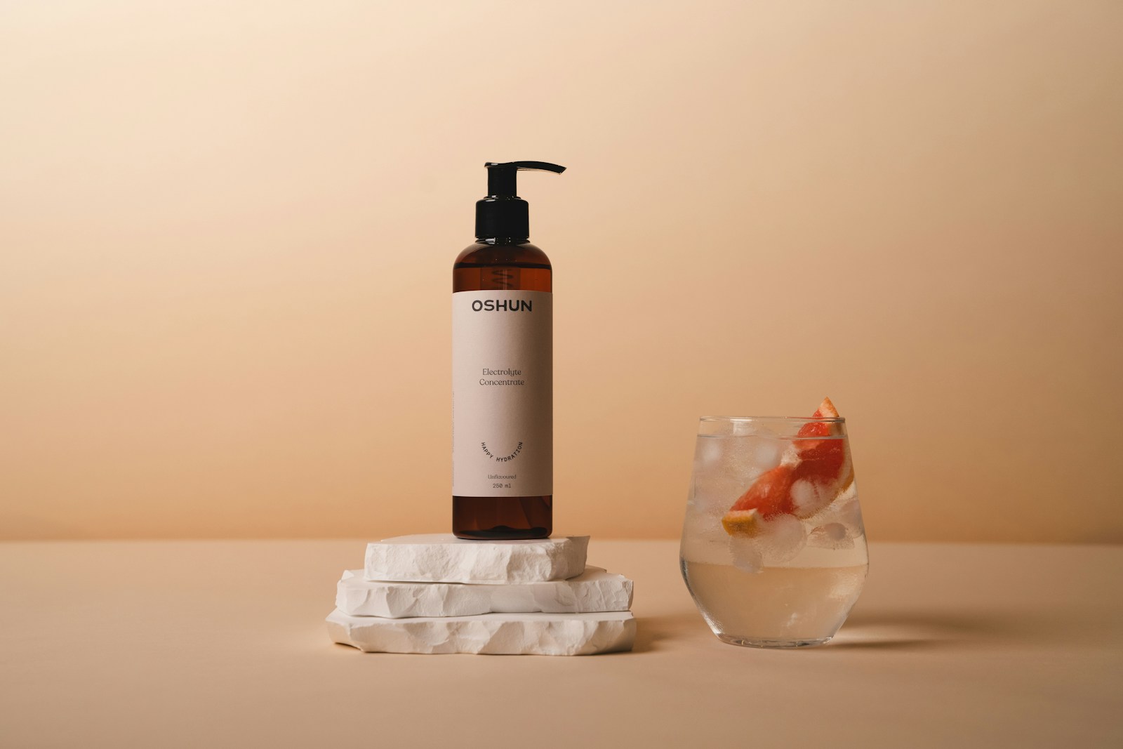 A product bottle photographed on a plinth against a plain studio backdrop, the kind of single product image ChatGPT Ads creative currently carries
